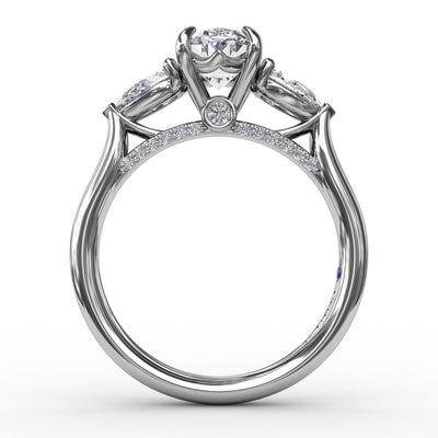 Classic Three-Stone Oval Engagement Ring With Pear-Shape Side Stones