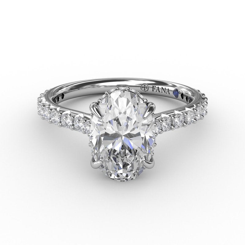 Classic Oval Diamond Solitaire Engagement Ring With Hidden Pavé Halo