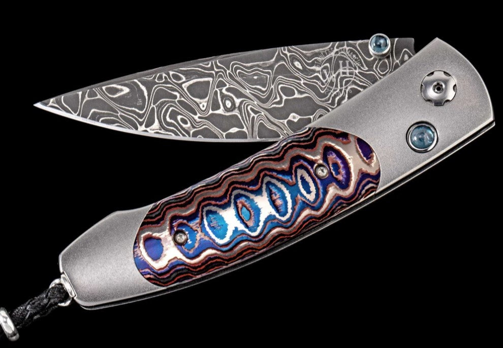 Titanium pocketknife with 'Wave' mokume and damascus blade