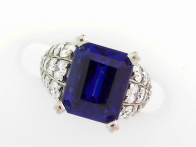 Platinum Emerald-Cut Tanzanite and Round Diamond Ring