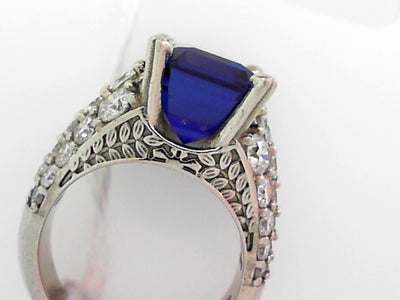 Platinum Emerald-Cut Tanzanite and Round Diamond Ring